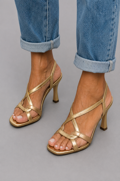 Solea | Sandalias doradas de tacón