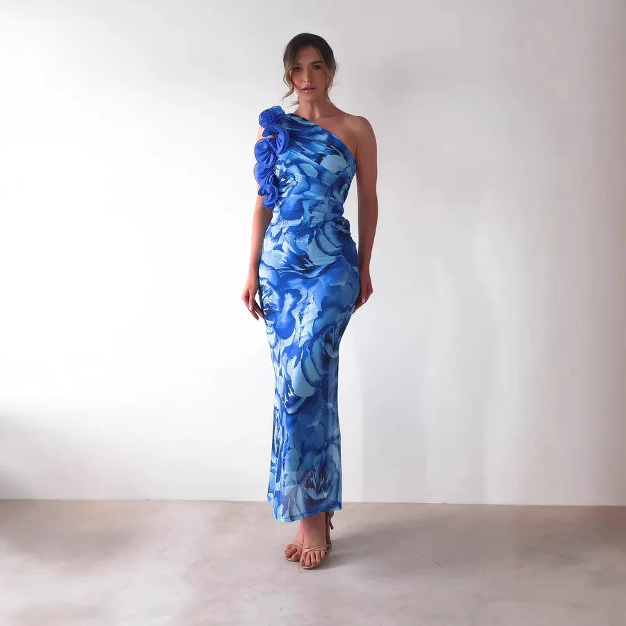 Isadora | Vestido midi floral con bajo sirena