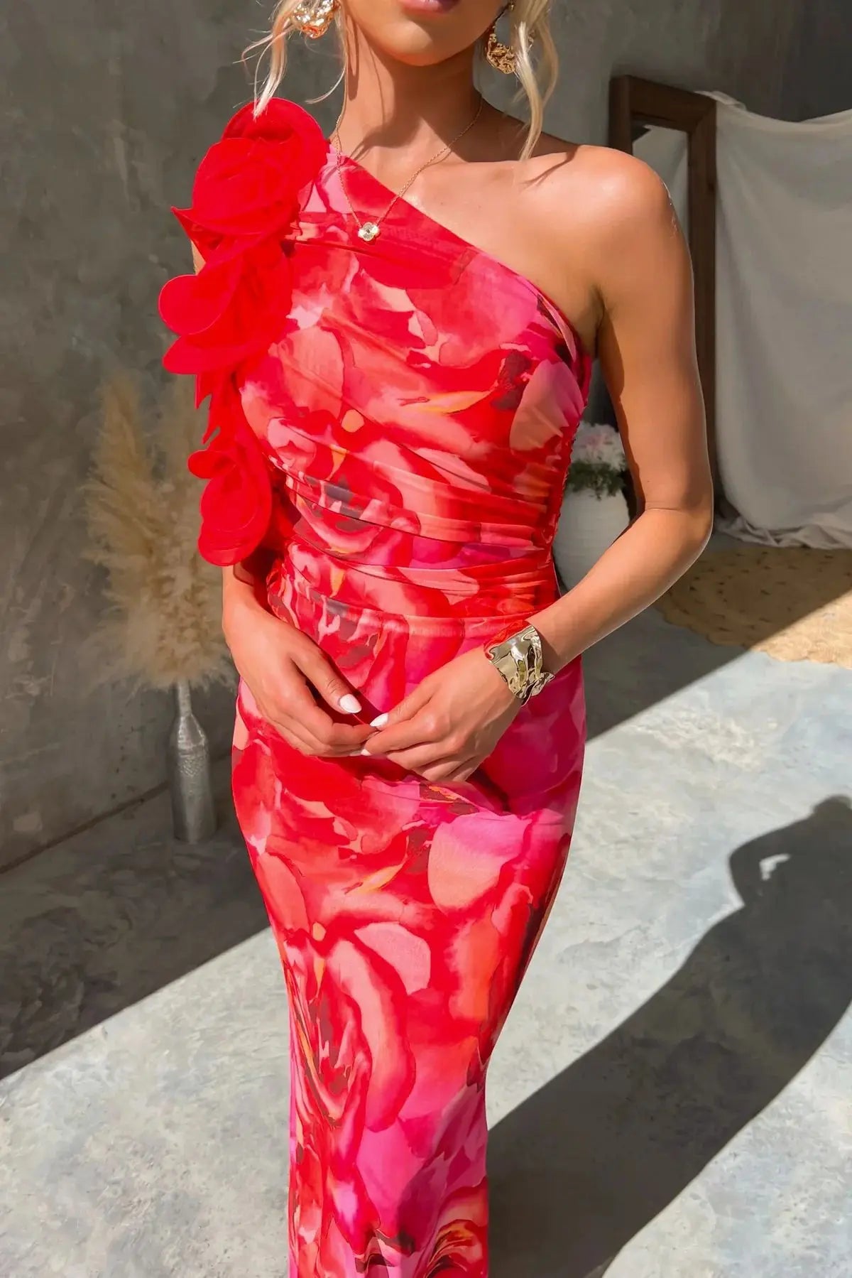 Isadora | Vestido midi floral con bajo sirena