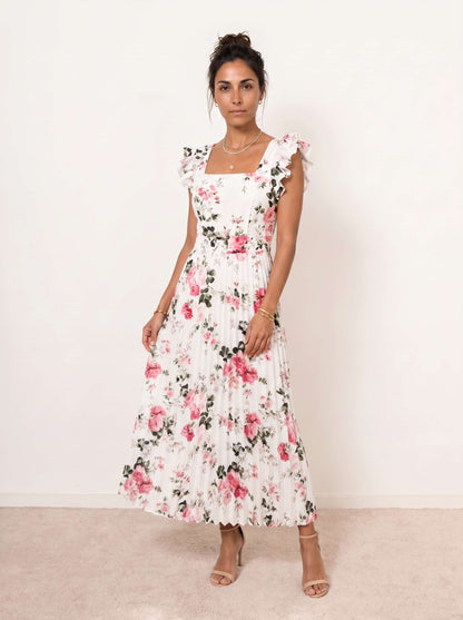 Rosalía | Vestido midi floral plisado con volantes